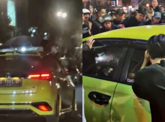 Heboh! Pria Ini Nekat Naik ke Kap Mobil sedang Melaju, Jadi Tontonan Warga di Pedestrian Eks MTQ Kendari. Foto: Tangkapan layar.